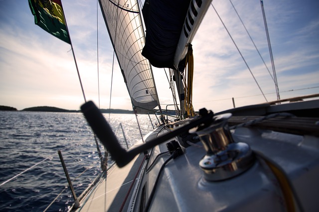 Sailing boat image to underline the importance of vitamin sea and the blue space health benefits effect
